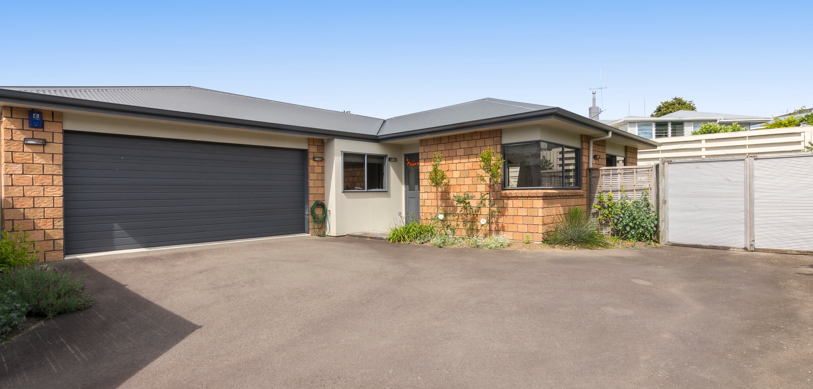 Property - Exterior With Garage   Evans Property Management - Evans Property Management